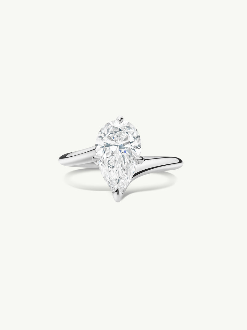 Pythia Serpentine Twist Solitaire Engagement Ring With Brilliant Pear-Cut Diamond In Platinum