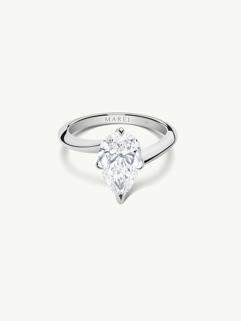 Pythia Serpentine Twist Solitaire Engagement Ring With Brilliant Pear-Cut Diamond In Platinum