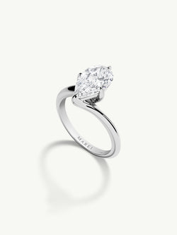 Pythia Serpentine Twist Solitaire Engagement Ring With Brilliant Pear-Cut Diamond In Platinum