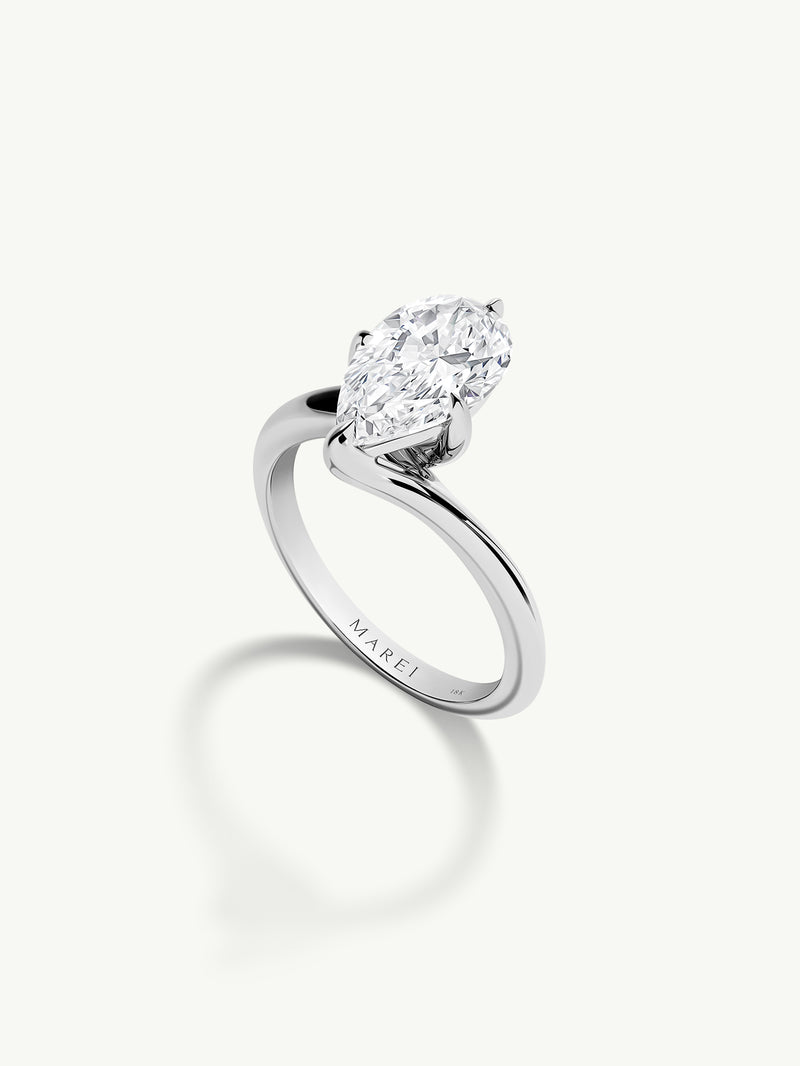 Pythia Serpentine Twist Solitaire Engagement Ring With Brilliant Pear-Cut Diamond In Platinum