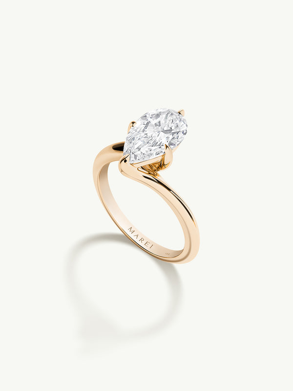 Pythia Serpentine Twist Solitaire Engagement Ring With Brilliant Pear-Cut Diamond In 18K Yellow Gold