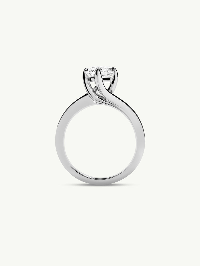 Pythia Serpentine Twist Solitaire Engagement Ring With Brilliant Pear-Cut Diamond In Platinum